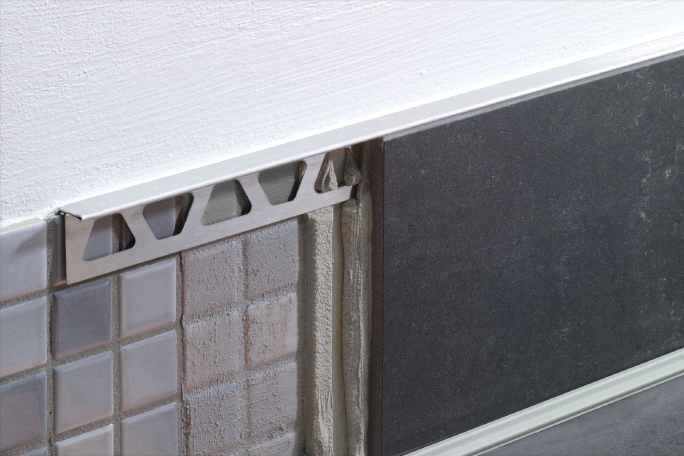 Schluter®-SCHIENE-STEP  Profile covers sub-assembly of countertops, stairs, and existing wall tile